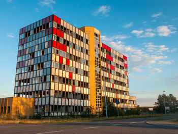 View of residential buildings against sky