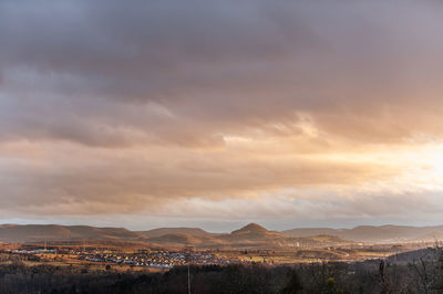 Scenic view of landscape against sky during sunset