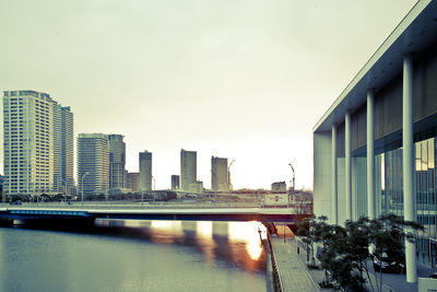 Modern cityscape against clear sky