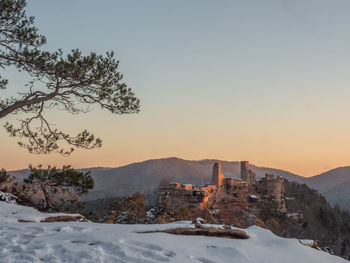 Buildings against sky during sunset