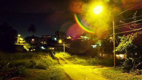 Illuminated street light at night