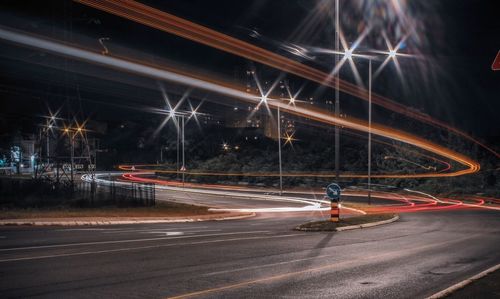 Light trails on city street at night