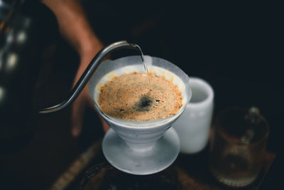 Close-up of coffee cup on table