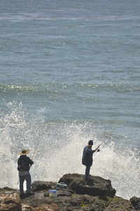 Full length of woman standing on shore