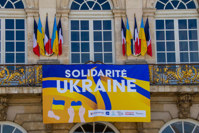 Nancy, france, april 18, 2022. solidarity with ukraine at war with russia. facade of the town hall