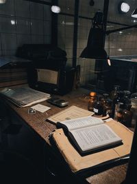 High angle view of illuminated electric lamp on table