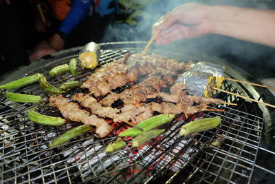 Close-up of meat on barbecue grill