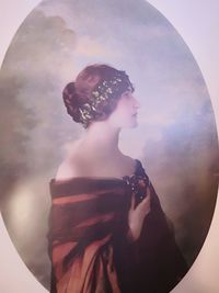 Side view of young woman looking away