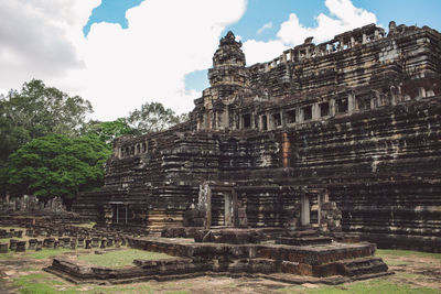 Old temple building against sky