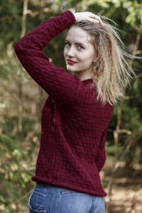 Portrait of young woman standing