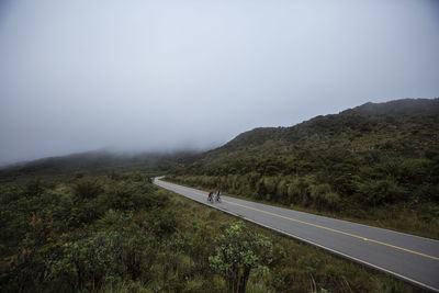 Scenic view of mountain road against sky