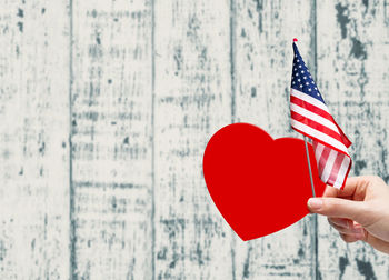 Close-up of hand holding umbrella