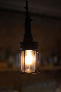 Close-up of illuminated light bulb