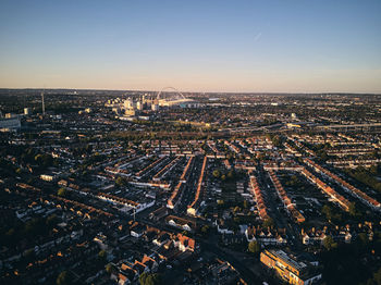 High angle view of city against sky during sunset