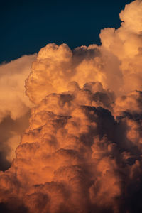 Low angle view of dramatic sky during sunset