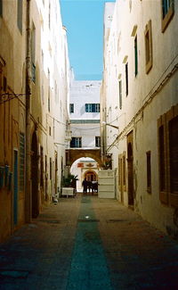 Narrow alley along buildings