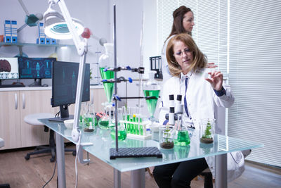 Portrait of female scientist working in laboratory