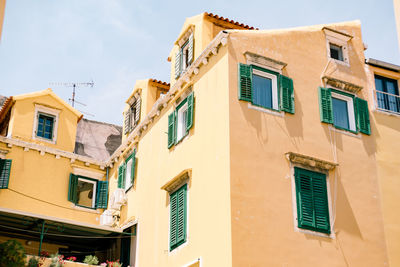 Low angle view of residential buildings against sky