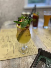 Close-up of lemon on glass table