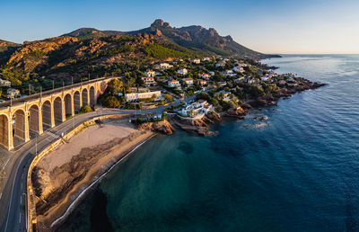 Bridge over sea against sky