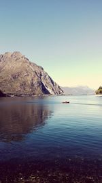 Scenic view of lake against clear sky