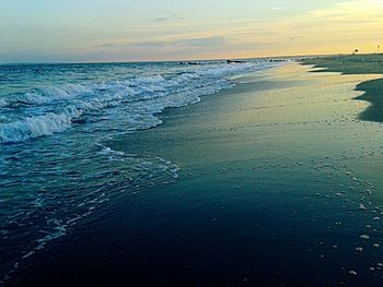 Scenic view of sea at sunset