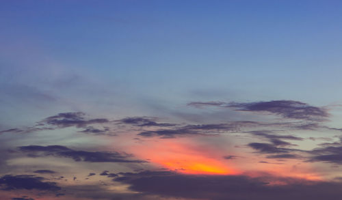 Low angle view of dramatic sky during sunset