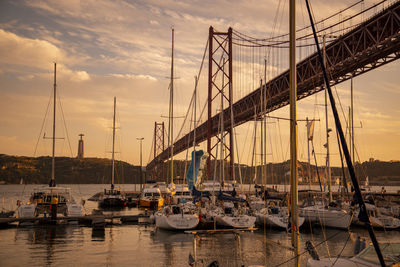 Boats moored at harbor