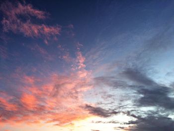 Low angle view of dramatic sky during sunset