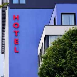 Low angle view of building against blue sky