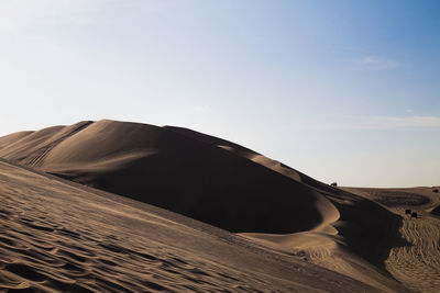 Scenic view of desert against sky