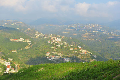 Aerial view of townscape against sky