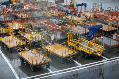 High angle view of trolleys on land