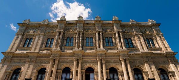 Low angle view of building against blue sky