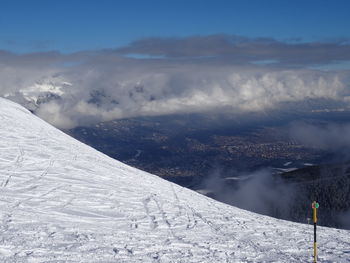 Scenic view of landscape against sky during winter