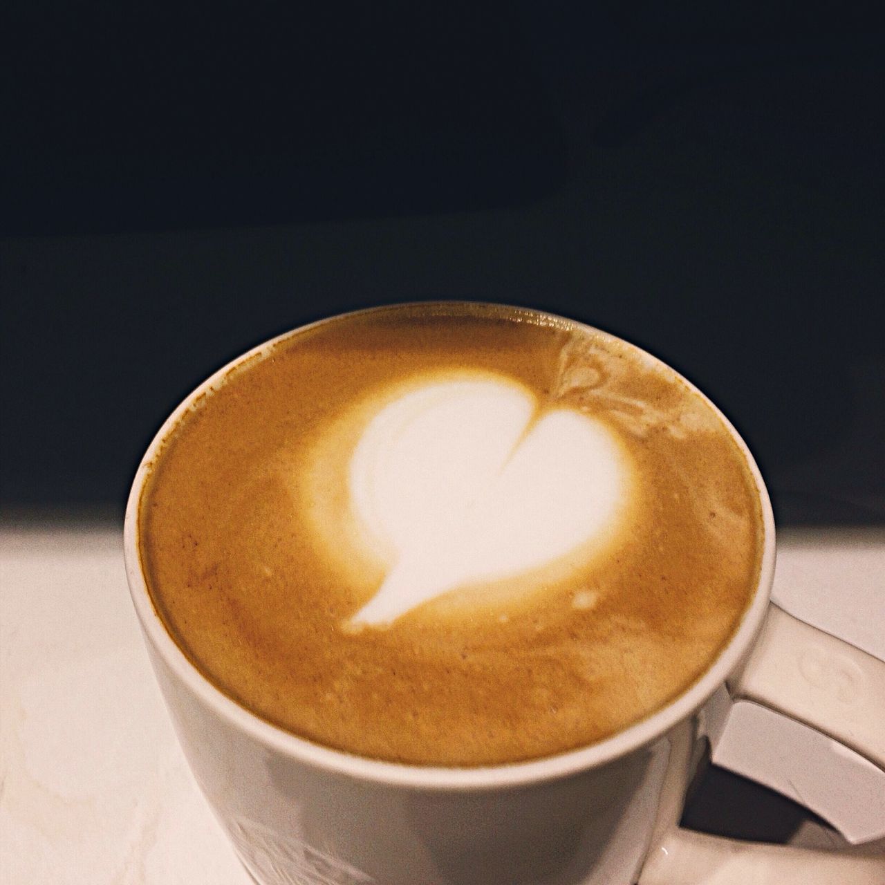 drink, refreshment, food and drink, coffee cup, frothy drink, coffee - drink, cappuccino, saucer, indoors, froth art, coffee, freshness, table, close-up, still life, beverage, cup, latte, froth, no people
