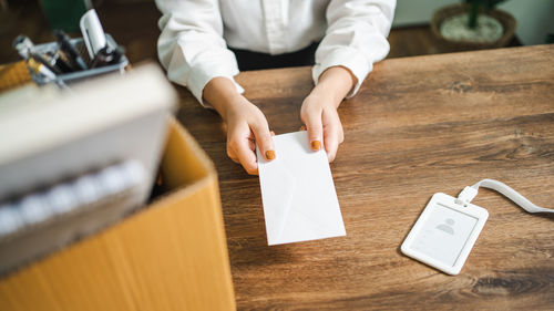 High angle view of man working on table