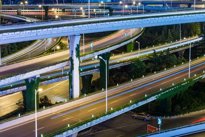 High angle view of light trails on elevated road