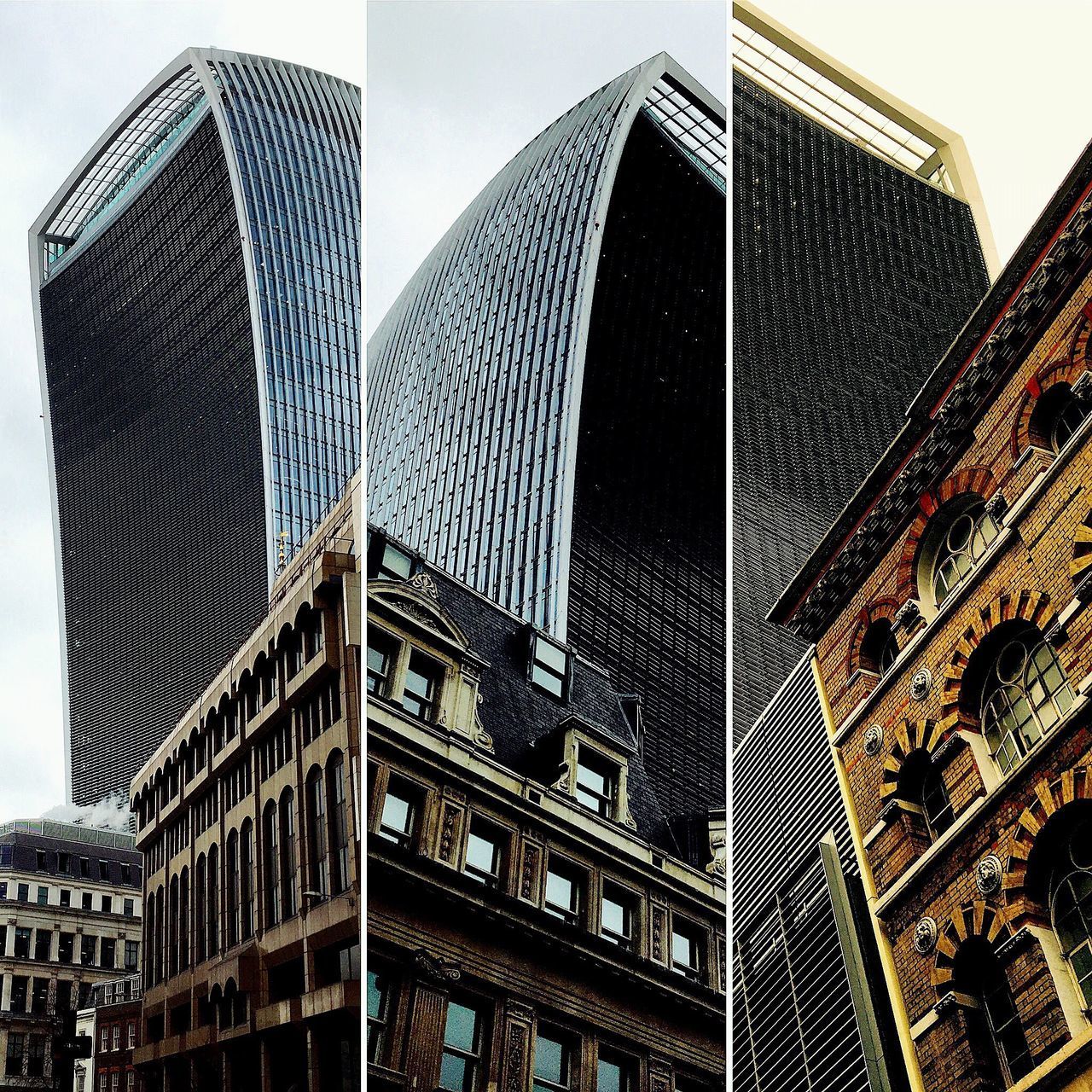 LOW ANGLE VIEW OF MODERN BUILDINGS AGAINST SKY