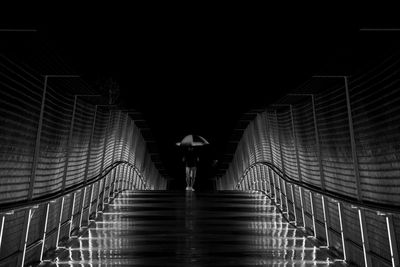 People walking in tunnel