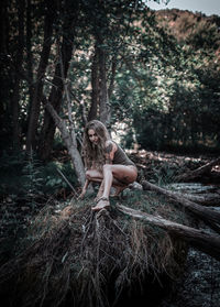 Portrait of woman in forest