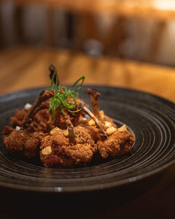 Close-up of food in plate on table