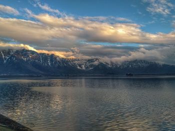 Scenic view of lake against sky during sunset