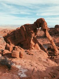 Rock formations on landscape against sky