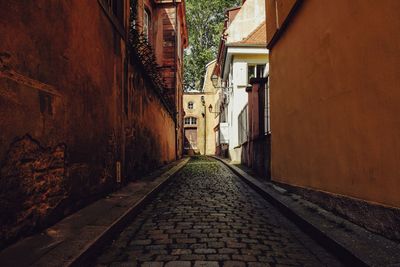 Narrow alley along buildings