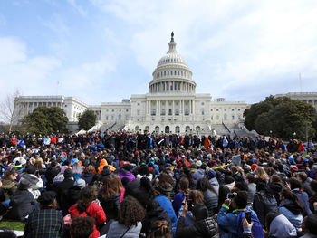 Group of people in front of the us capitol building in washington dc.