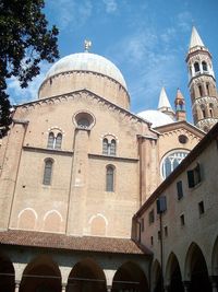 Low angle view of church against blue sky