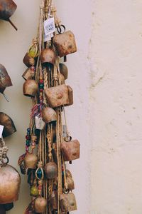 Close-up of decoration hanging against wall