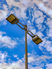 Low angle view of street light against sky