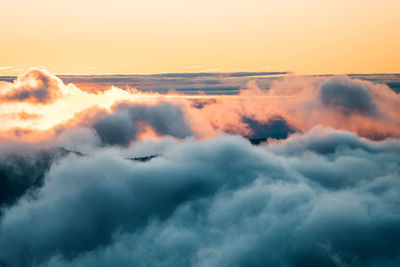 Low angle view of cloudscape against sky during sunset